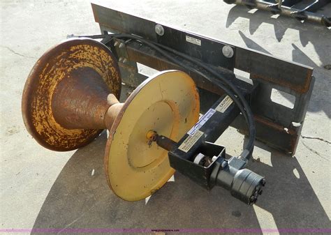 wire roller skid steer attachment